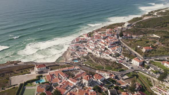 Azenhas do Mar picturesque town on top of cliffs overlooking the ocean, Portuguese  Atlantic coast.