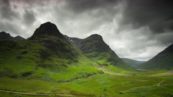 TIME LAPSE - The Three Sisters of Glen Coe, Scottish Highlands, wide zoom in