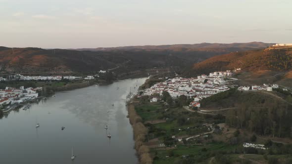 Aerial Drone View of Sanlucar De Guadiana in Spain and Alcoutim in Portugal