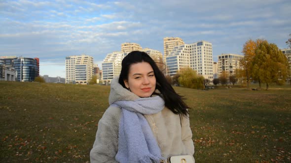 Beautiful Young Girl Portrait in the City on a Cold Autum