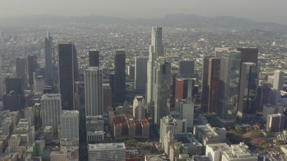 AERIAL: Breathtaking Wide Shot of Downtown Los Angeles, California Skyline in Beautiful Sunlight