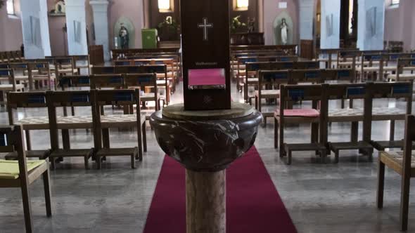 Empty Catholic Cathedral Inside Wooden Benches for Prayers Church Interior