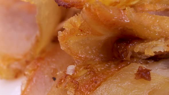 Macro shot of halal kebab meat. Shawarma meat pieces, close up view in rotating motion.