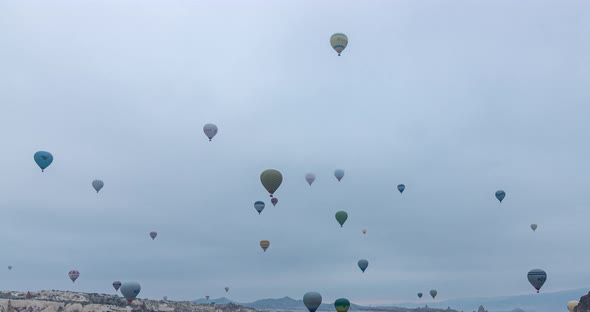 Hot Air Balloons Flying Over the Valley at Cappadocia Turkey