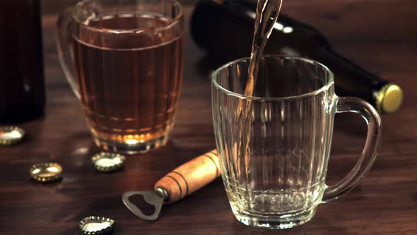 Super Slow Motion in the Glass Pours Fresh Beer Whirlpool with Splashes