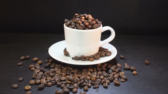 Coffee Grains Falling In White Cup