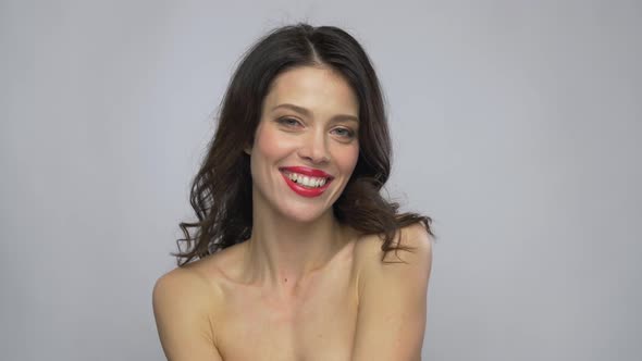 Beautiful Smiling Young Woman with Red Lipstick 