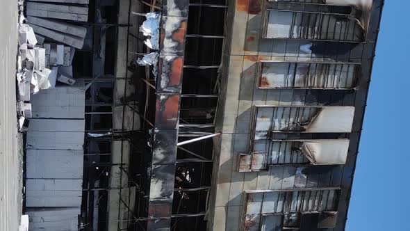 Vertical Video of a Destroyed Building of a Shopping Center in Bucha Ukraine