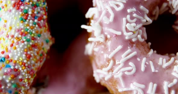 Close-up of tasty doughnuts with sprinkles