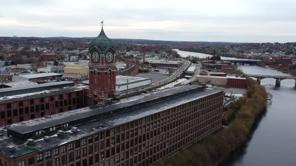 Exterior Of Museum With Ayer Mill Clock Tower Along Merrimack River At Early Morning In Lawrence, Ma