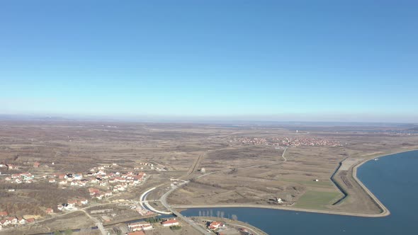 Descending on landscape with river Danube in Eastern Serbia 4K aerial video