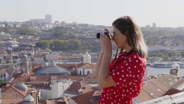 Pretty Woman, Traveler Is Taking a Photo of Urban Panorama of Porto