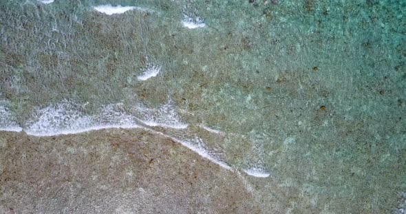 Luxury aerial clean view of a sunshine white sandy paradise beach and aqua turquoise water background