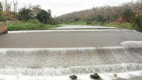 Traveling front over a river, dam on a river in Angola, Africa 7