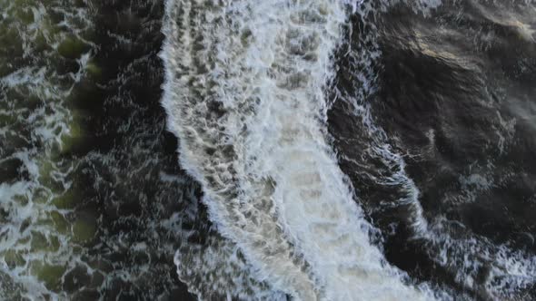 Drone Aerial View on a Motorboat Running on the Azure Waters