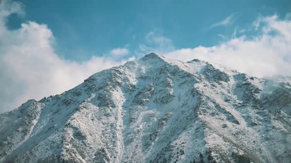 The clouds around the winter mountain