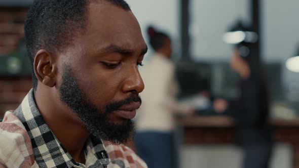 Closeup Portrait of African American Software Developer Working Focused