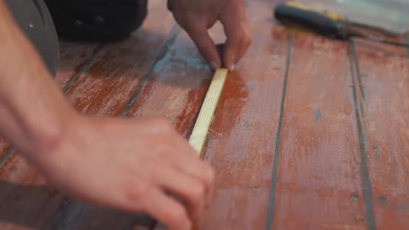 Shaving wooden roof plank join test fitting insert repair