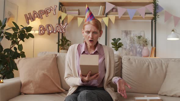 Joyful Woman With Birthday Present