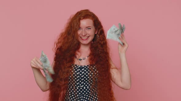 Redhead Girl Holding Cash Money Dollar Celebrate Dance Success Business Career Lottery Game Winner