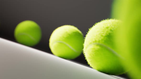 Seamless looping animation of supply of tennis balls. Equipment for tennis. 4KHD