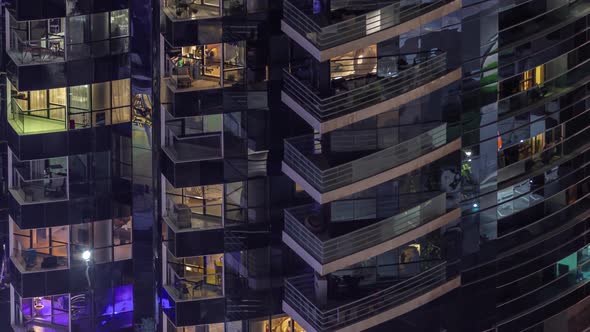 Night View of Glowing Windows in Apartment Tower Timelapse