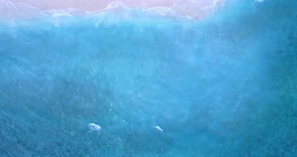 Tropical flying abstract shot of a summer white paradise sand beach and aqua turquoise water backgro