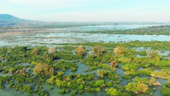 Aerial: flying over Don Det and the 4000 islands Mekong River in Laos