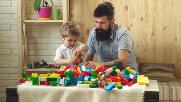 Father and Son Having Fun at Home, Family Fatherhood and Childhood Concept