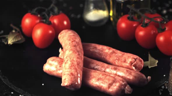 Super Slow Motion on a Stone Board Fall Raw Sausage