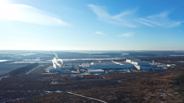 Industrial Factory in Environment Under Blue Sky