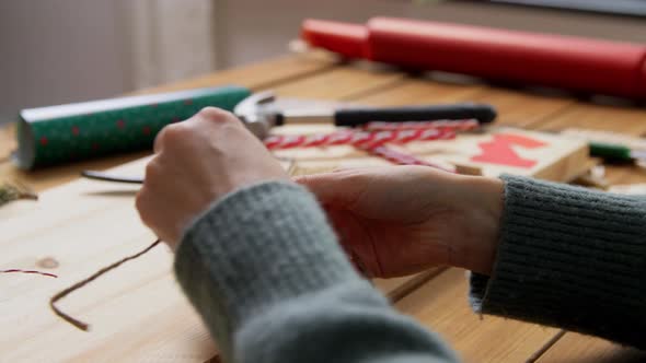 Hands Making Advent Calender on Christmas at Home