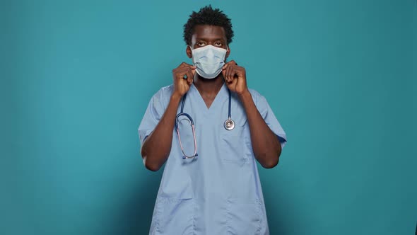 Man Nurse Wearing Face Mask for Protection Against Coronavirus