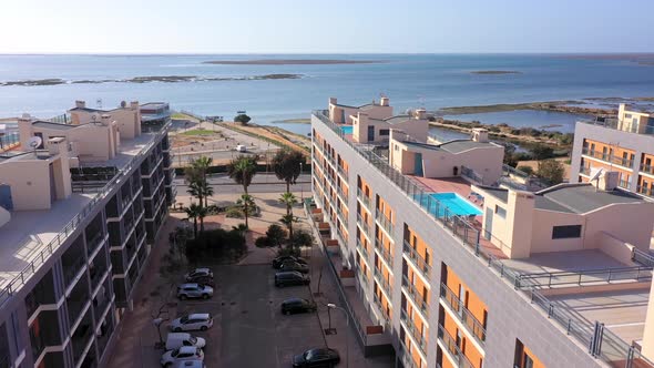 Aerial View of the Urban Area of Portugal in the South of Houses with Modern Infrastructure Swimming