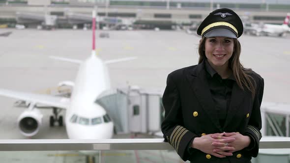 Young Attractive Professional Woman Pilot Succeed in Aviation Business
