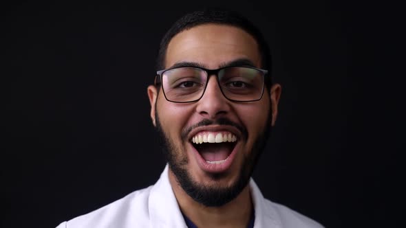 Smiling african american dentist. Face close up.