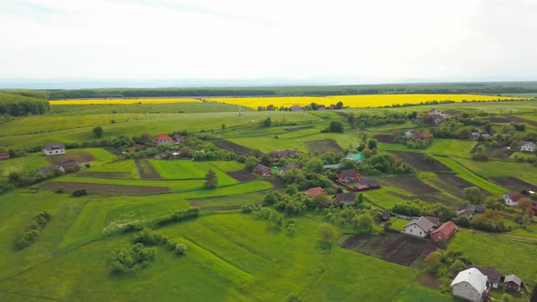 Aerial Drone View of Green Agricultural Field in the Countryside of Ukraine