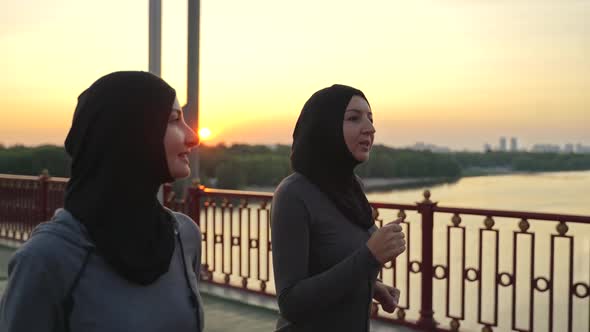 Sporty Muslim Females in Hijabs During Evening Run