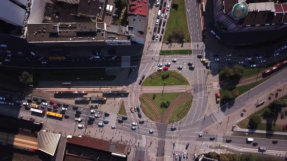 Aerial view of junction with traffic and people. 4K resolution