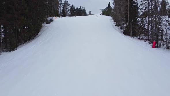 Aerial View of Downhill Skiing at Local Ski Resort. Ski Lift. Russia, Leningrdaskaya Oblast, Village