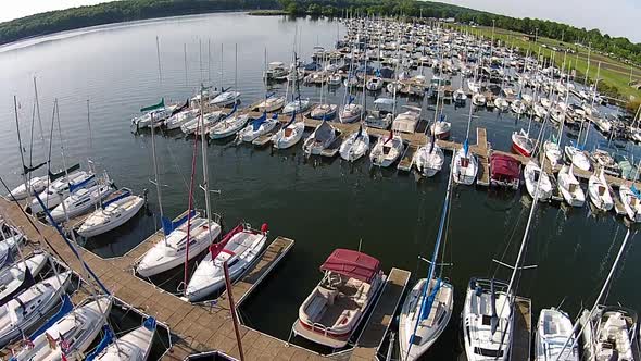 Aerial footage of sailboat marina.