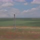 Aerial view of wind turbines energy production and road on fields. 4k shot footage - VideoHive Item for Sale