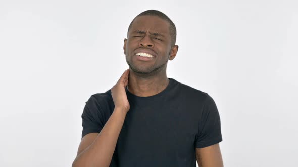 Young African Man with Neck Pain on White Background