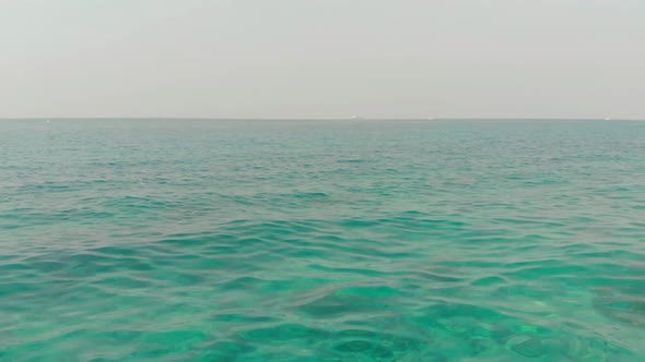 Motion Close Above Perfect Turquoise Rippling Ocean Water