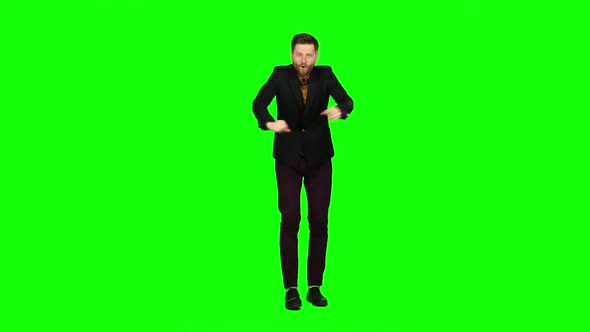Young Guy Is Happy with His Victories, He Is Happy. Green Screen