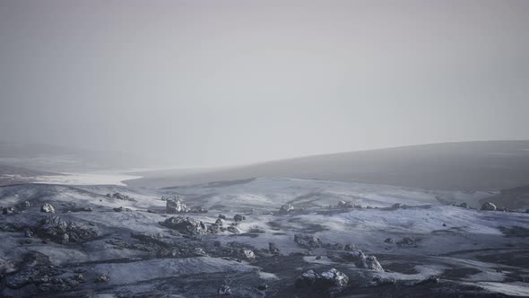 Antarctic Mountains with Snow in Fog