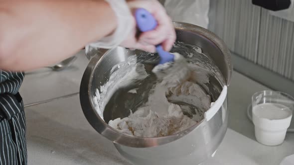 Woman Chef Making a Cake  Mixing the Cream for Cake