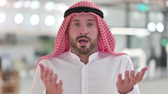 Arab Businessman Feeling Shocked, Surprised 