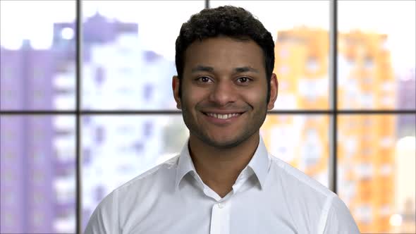 Close Up Portrait of a Cheerful Hindu Man Smiling with Teeth