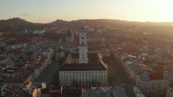 Flight Above the Roofs on Sunrise. Old European City. Ukraine Lviv City